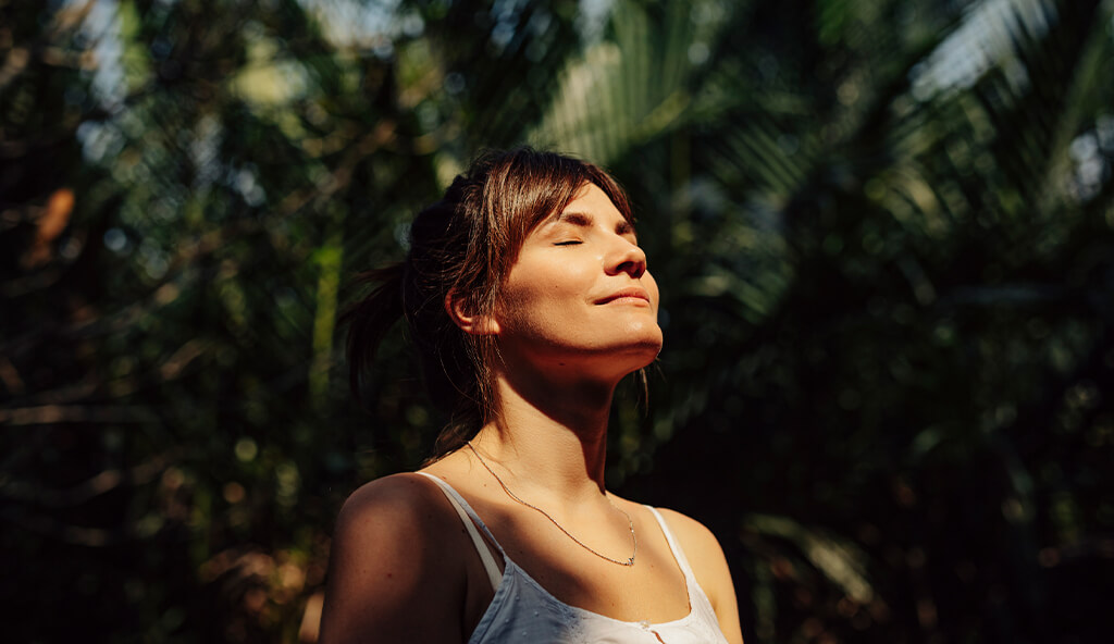woman breathing in natural air
